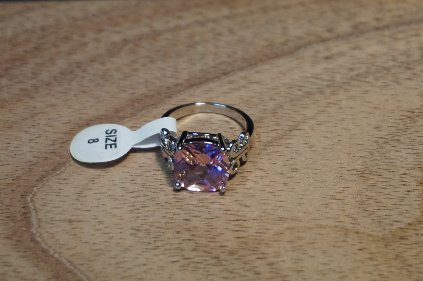 Ring with pink gemstone size 8