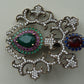 A fine antique silver brooch with gemstones and zircon