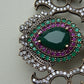 A fine antique silver brooch with gemstones and zircon