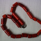 A fine red coral beads string