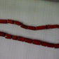 A fine red coral beads string